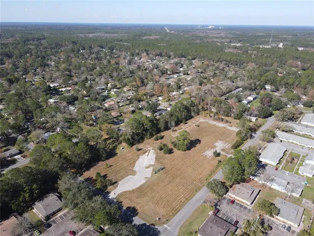 an aerial view of a house with a outdoor space