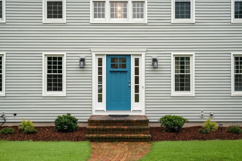 45 Eastside Road Wrentham, MA 02093 - Photo 3 of 35 a view of a house with many windows and plants