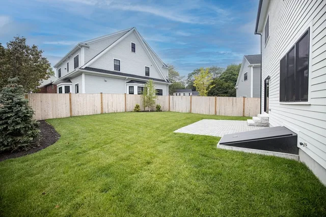 a view of a back yard of the house