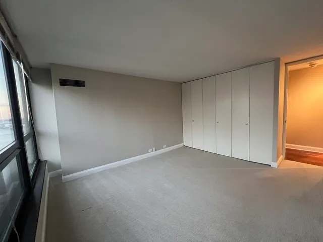 an empty room with window