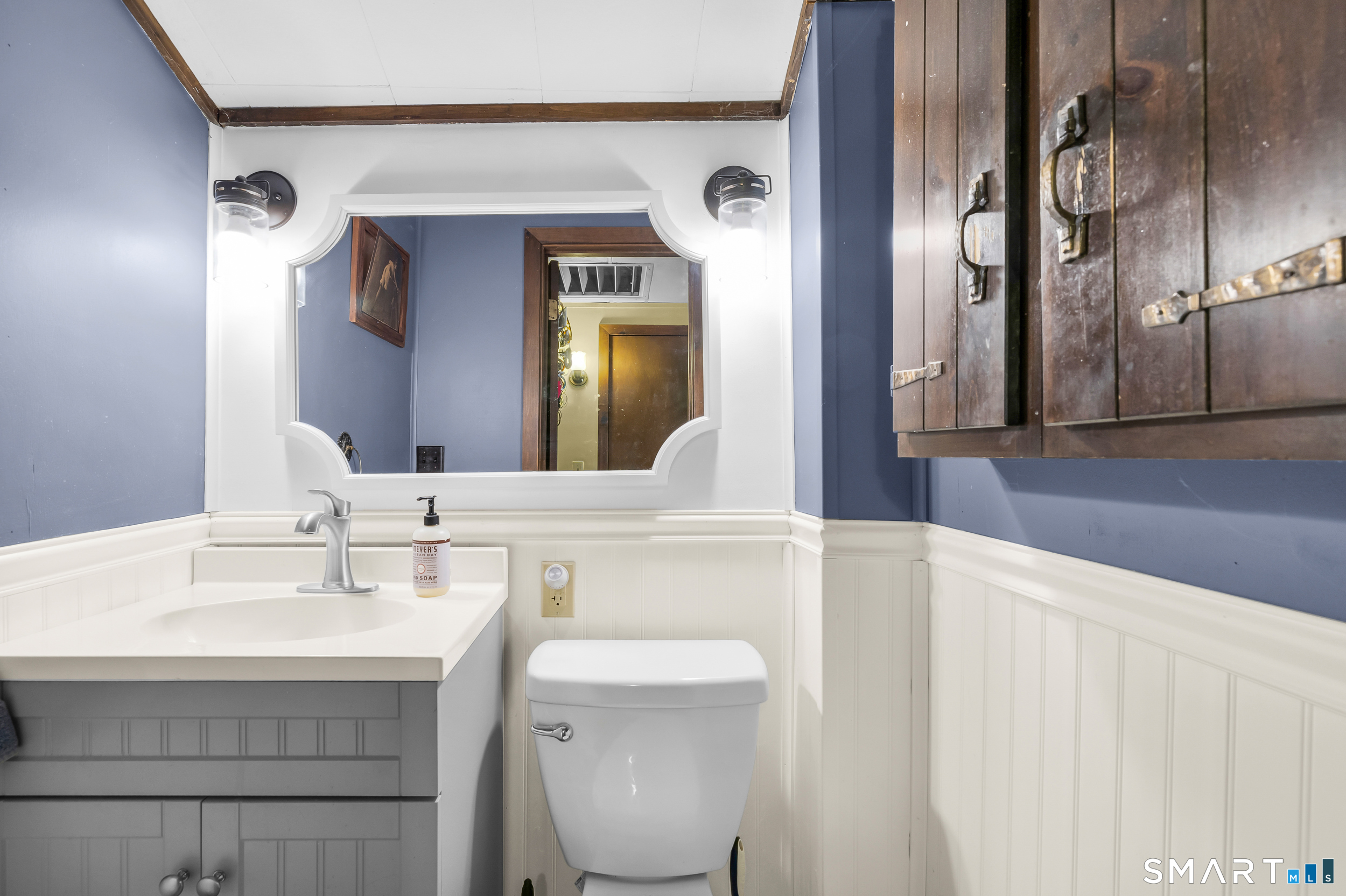 90 A Rowley Road Woodbury, CT 06798 - Photo 22 of 40 a bathroom with a sink vanity mirror and toilet