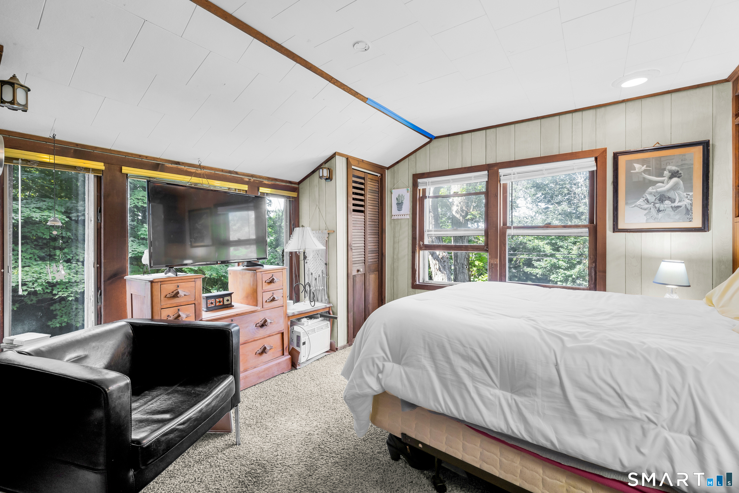 90 A Rowley Road Woodbury, CT 06798 - Photo 23 of 40 a bedroom with a large bed and a large window