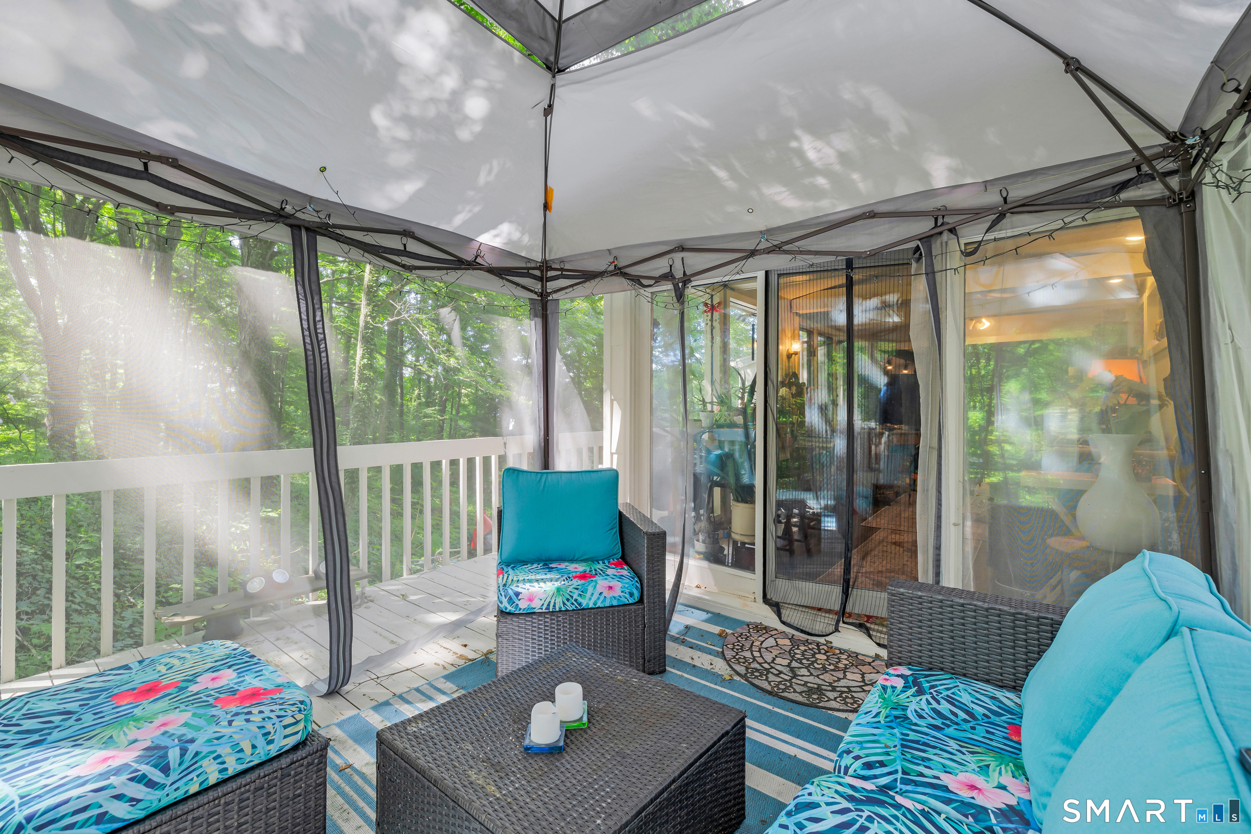 90 A Rowley Road Woodbury, CT 06798 - Photo 25 of 40 a living room with a couch and a table
