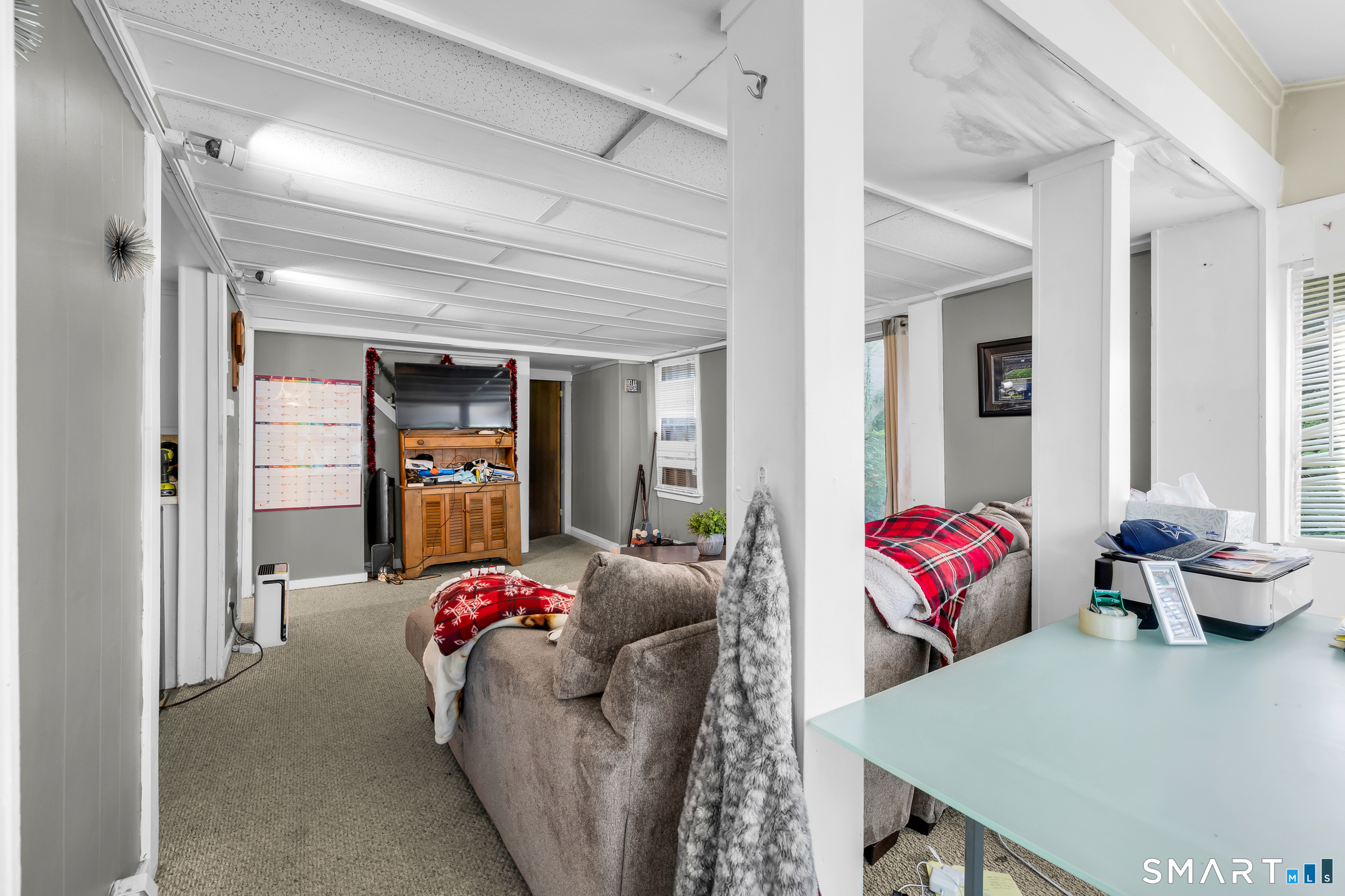 90 A Rowley Road Woodbury, CT 06798 - Photo 6 of 40 a living room with furniture and a window