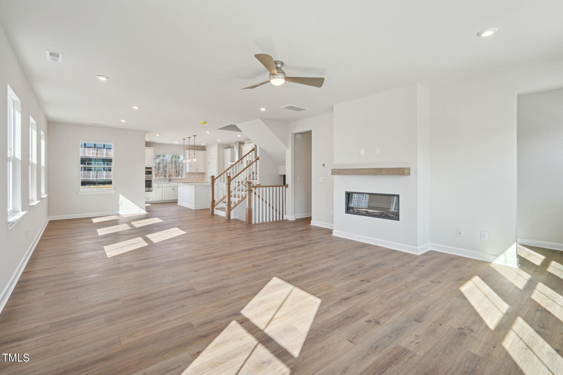 4717 Cypress Tree Lane Raleigh, NC 27612 - Photo 7 of 11 Elm Park 59_Living Room 1_2.3.25_webread