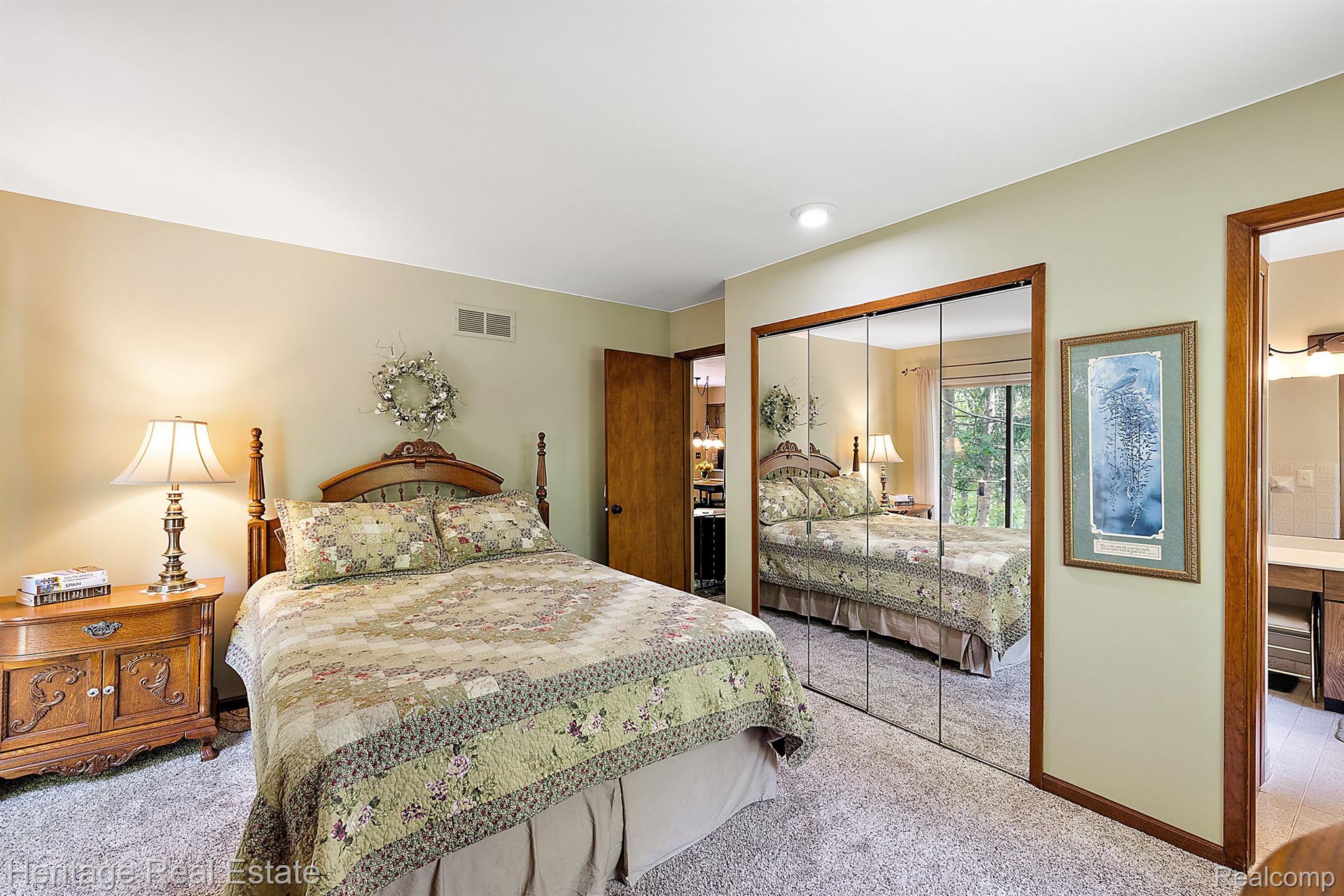 3190 West Brocker Road Metamora, MI 48455 - Photo 25 of 75 Main level primary bedroom suite