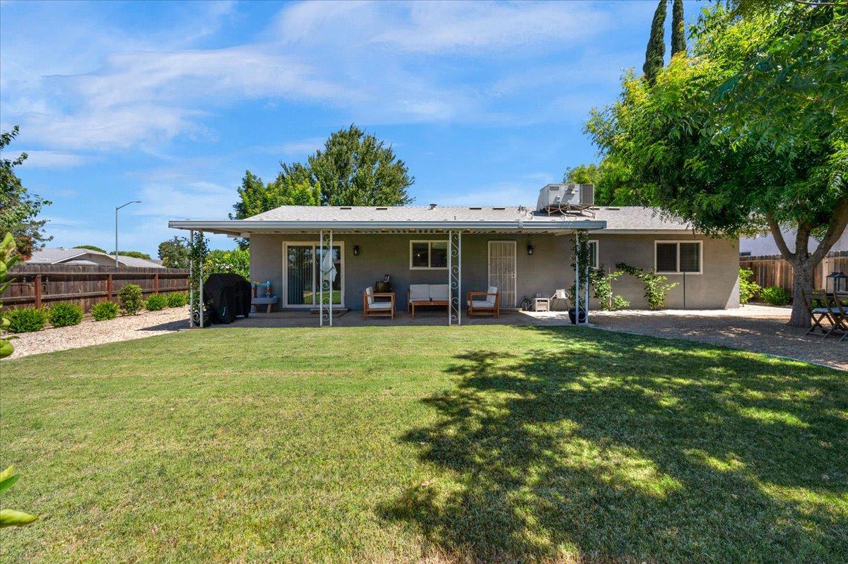 1448 Ashcroft Avenue Clovis, CA 93611 - Photo 34 of 46 a view of a house with a backyard