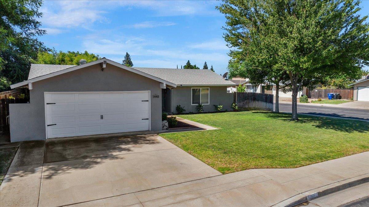 1448 Ashcroft Avenue Clovis, CA 93611 - Photo 39 of 46 a view of a house with a yard
