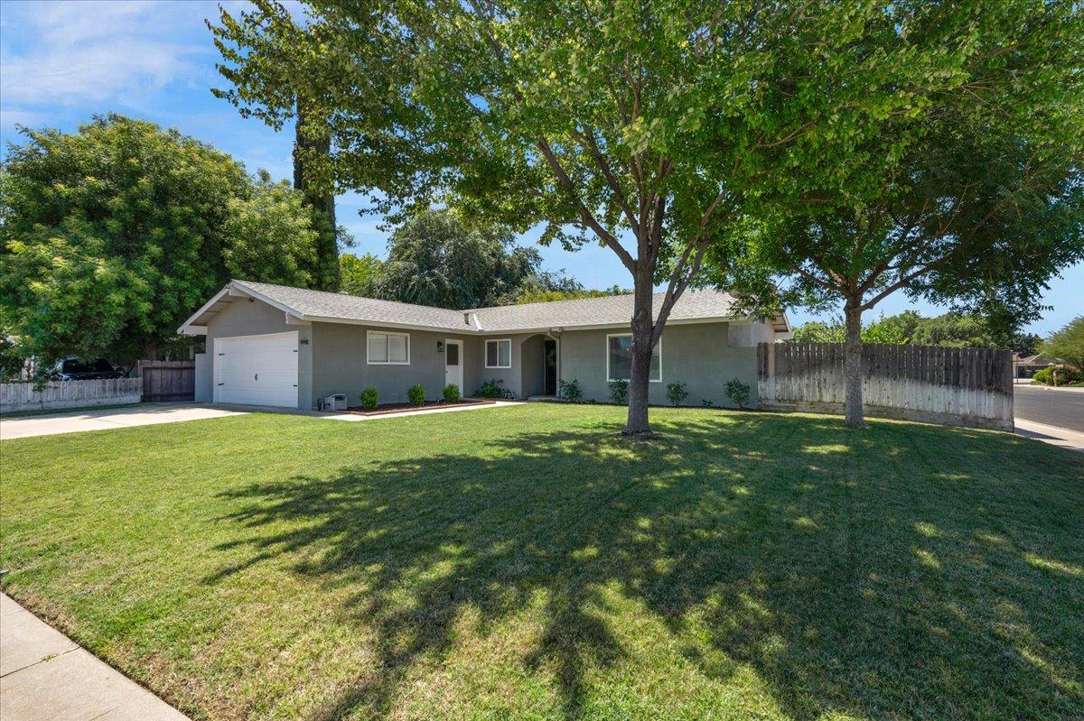 1448 Ashcroft Avenue Clovis, CA 93611 - Photo 40 of 46 a house view with a garden space