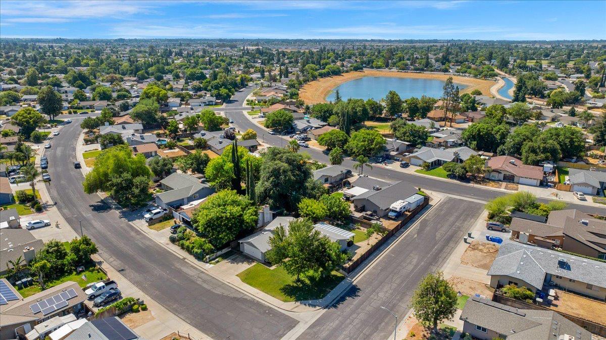 1448 Ashcroft Avenue Clovis, CA 93611 - Photo 41 of 46 an aerial view of a city with lots of residential buildings and mountain view in back