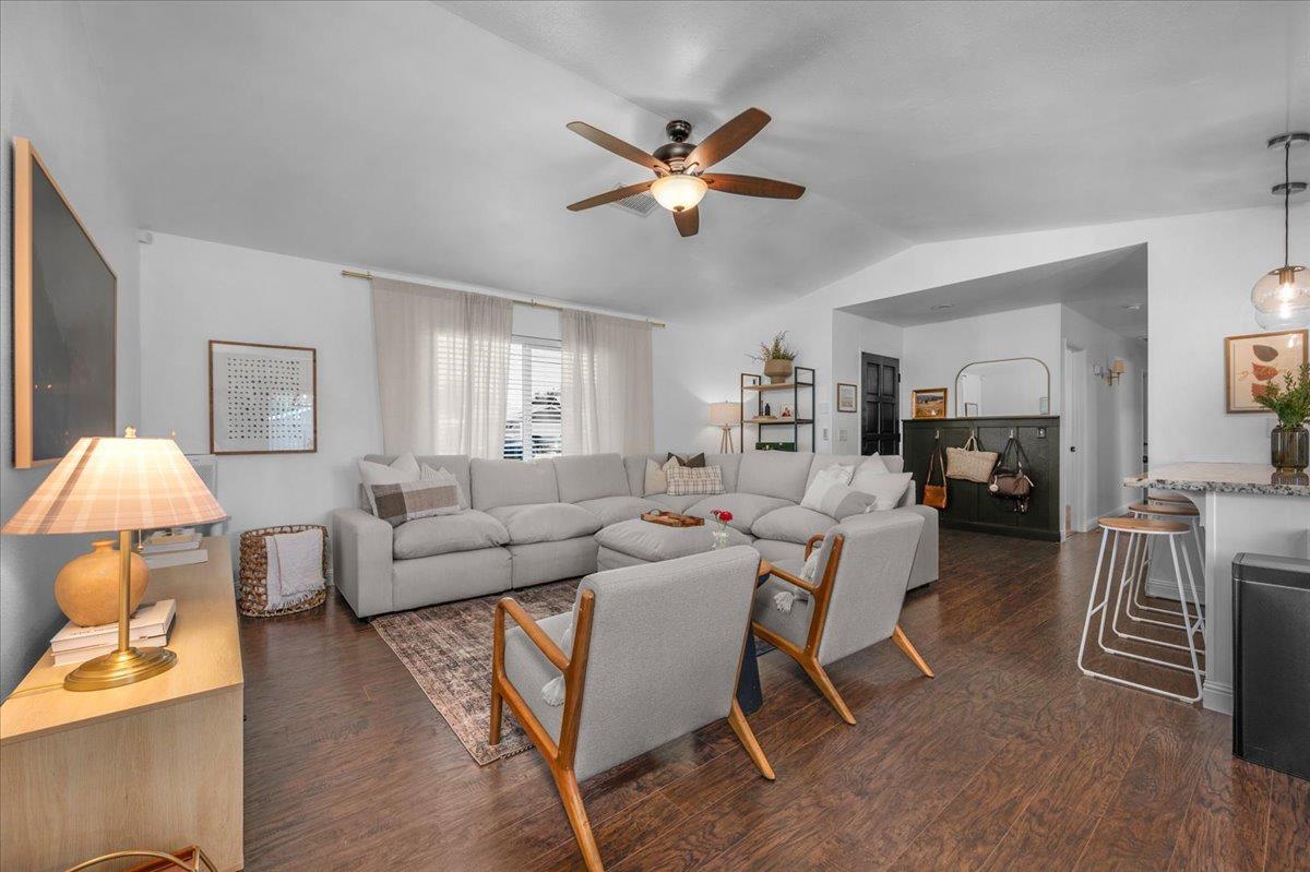 1448 Ashcroft Avenue Clovis, CA 93611 - Photo 5 of 46 a living room with furniture and a wooden floor