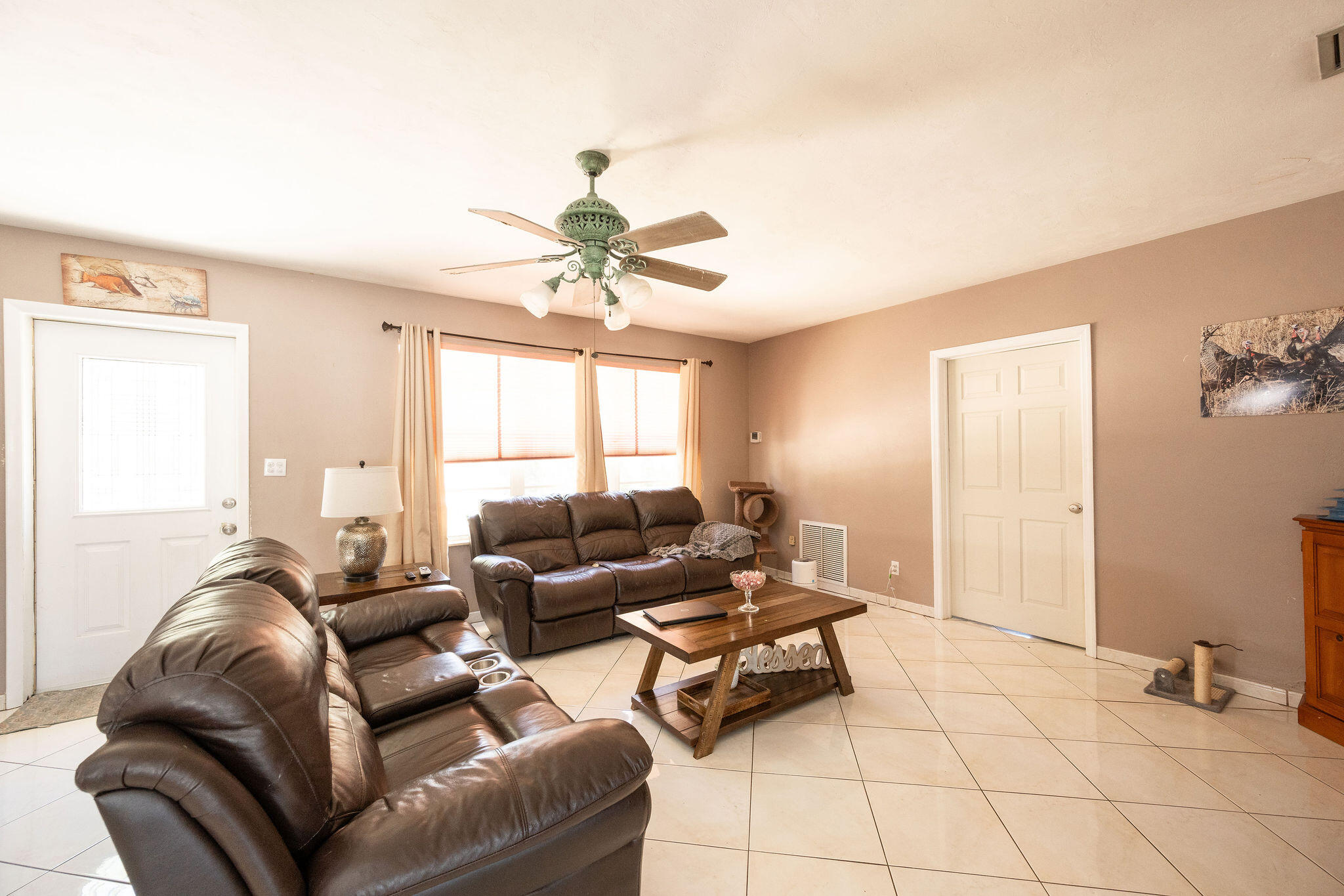 1409 4th Street Key West, FL 33040 - Photo 15 of 58 a living room with furniture and a large window