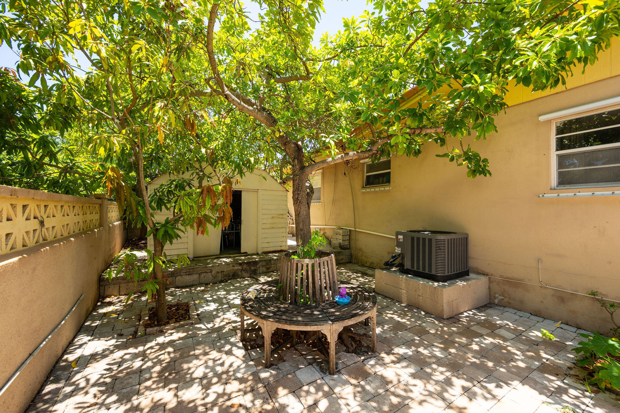 1409 4th Street Key West, FL 33040 - Photo 52 of 58 a view of a chairs and table in backyard