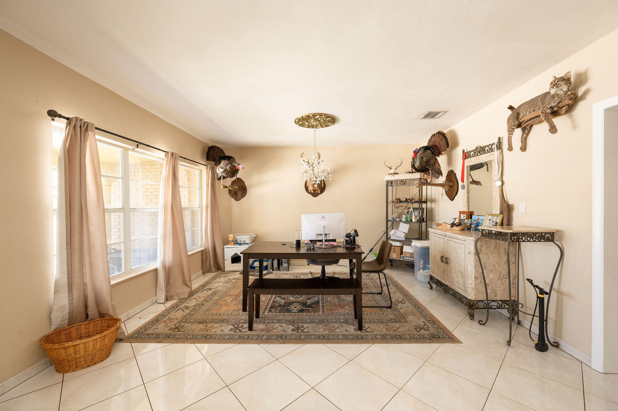 1409 4th Street Key West, FL 33040 - Photo 10 of 58 a dining room with furniture and a floor to ceiling window