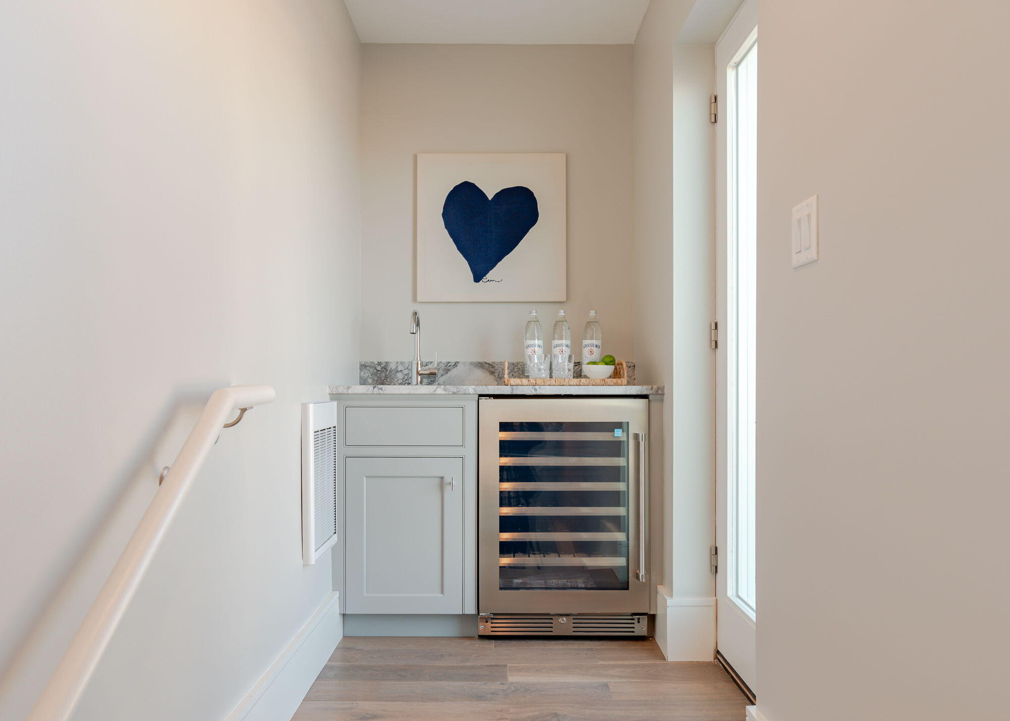 387 Commercial Street, Unit 710 Portland, ME 04101 - Photo 21 of 45 Wine Fridge and entrance to rooftop deck