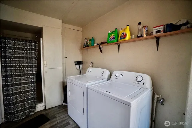 a bathroom with a toilet a sink and vanity