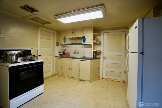 a bathroom with a sink and mirror