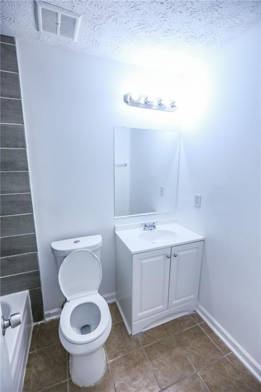 1967 Singer Way Lithonia, GA 30058 - Photo 22 of 28 a bathroom with a sink and a toilet