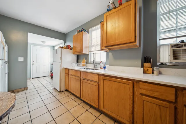 a bedroom with a bed and a table