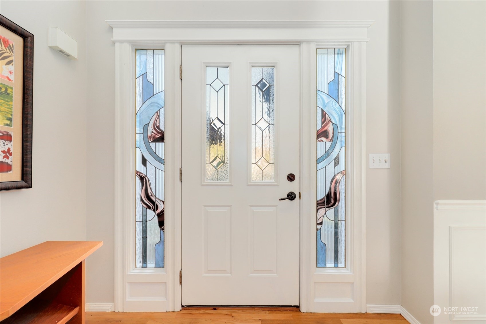 23303 14th Place West Bothell, WA 98021 - Photo 3 of 30 a view of entryway with wooden floor and door