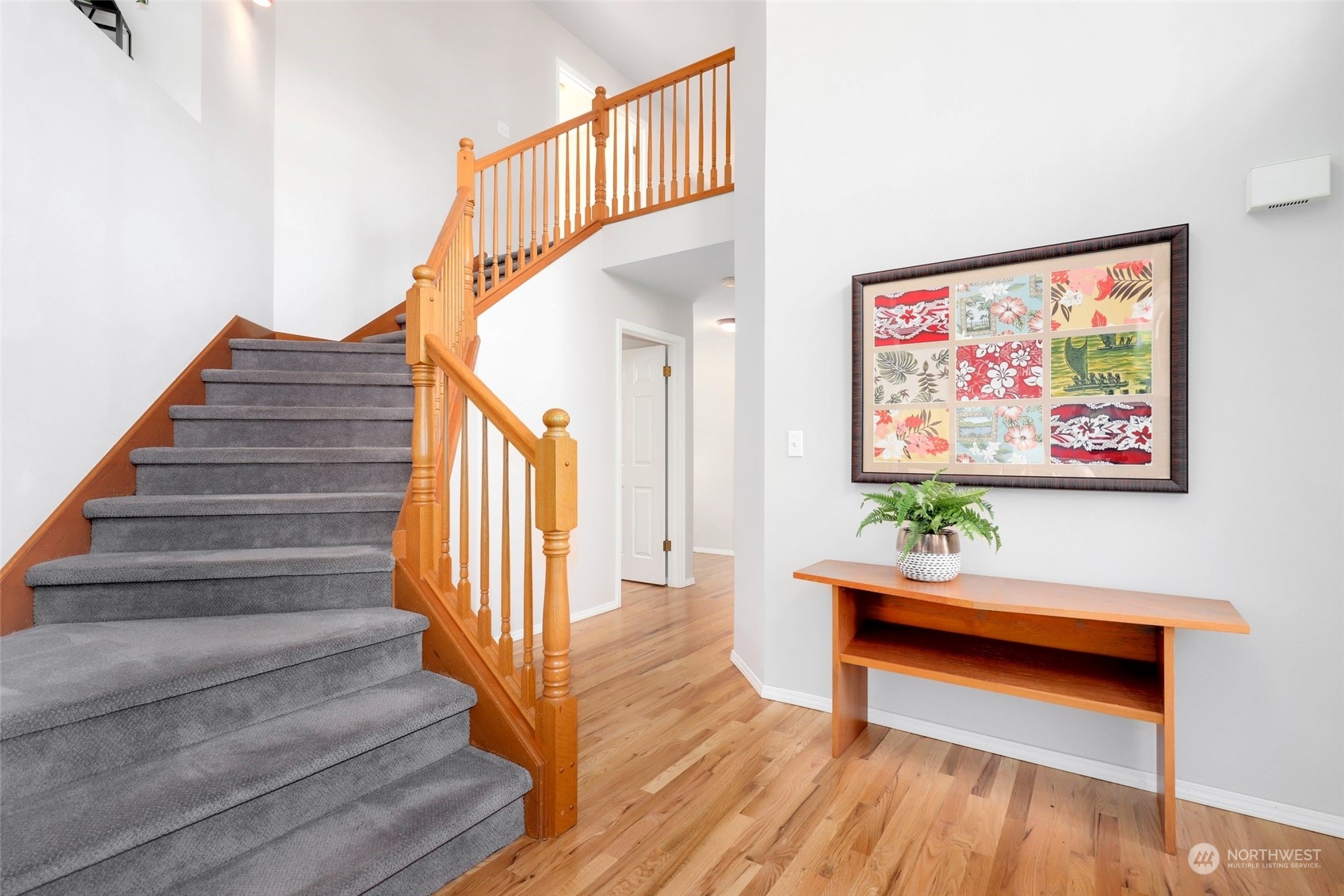 23303 14th Place West Bothell, WA 98021 - Photo 4 of 30 a view of entryway and hall with wooden floor