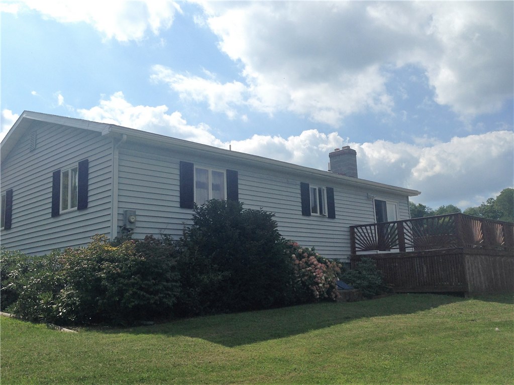 5177 Reddy Road Wellsville, NY 14895 - Photo 1 of 1 Front View of home with a beautiful view of the hi