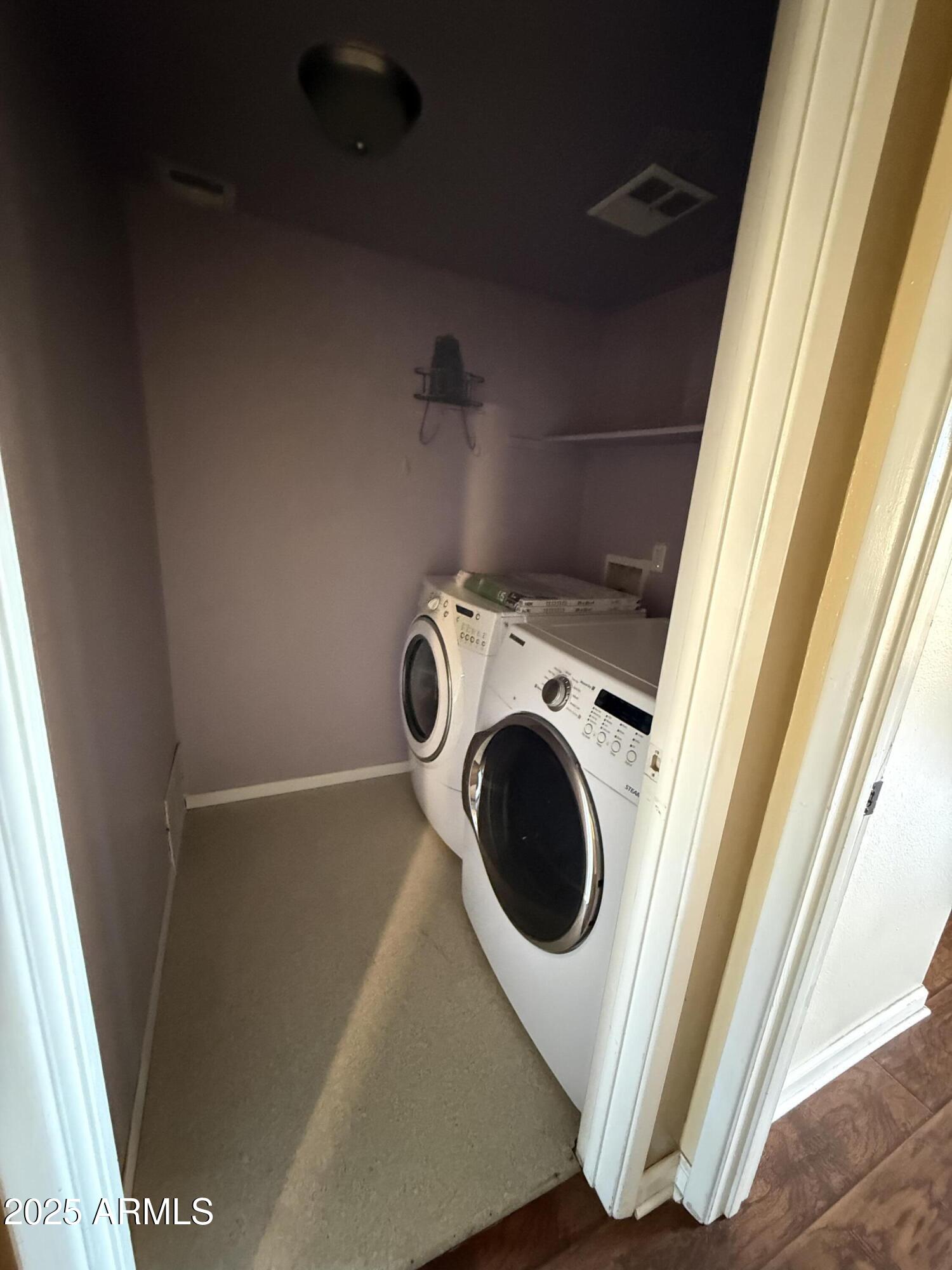 1425 East Desert Cove Avenue East, Unit 66 Phoenix, AZ 85020 - Photo 9 of 17 a utility room with dryer and washer