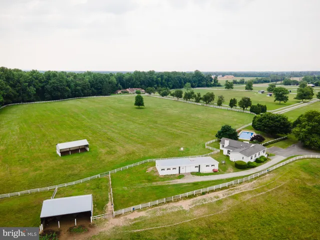 a view of a lake with a yard