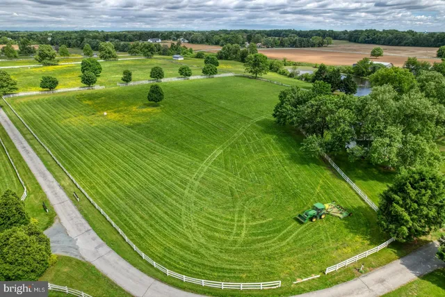 a view of a golf course with a lake