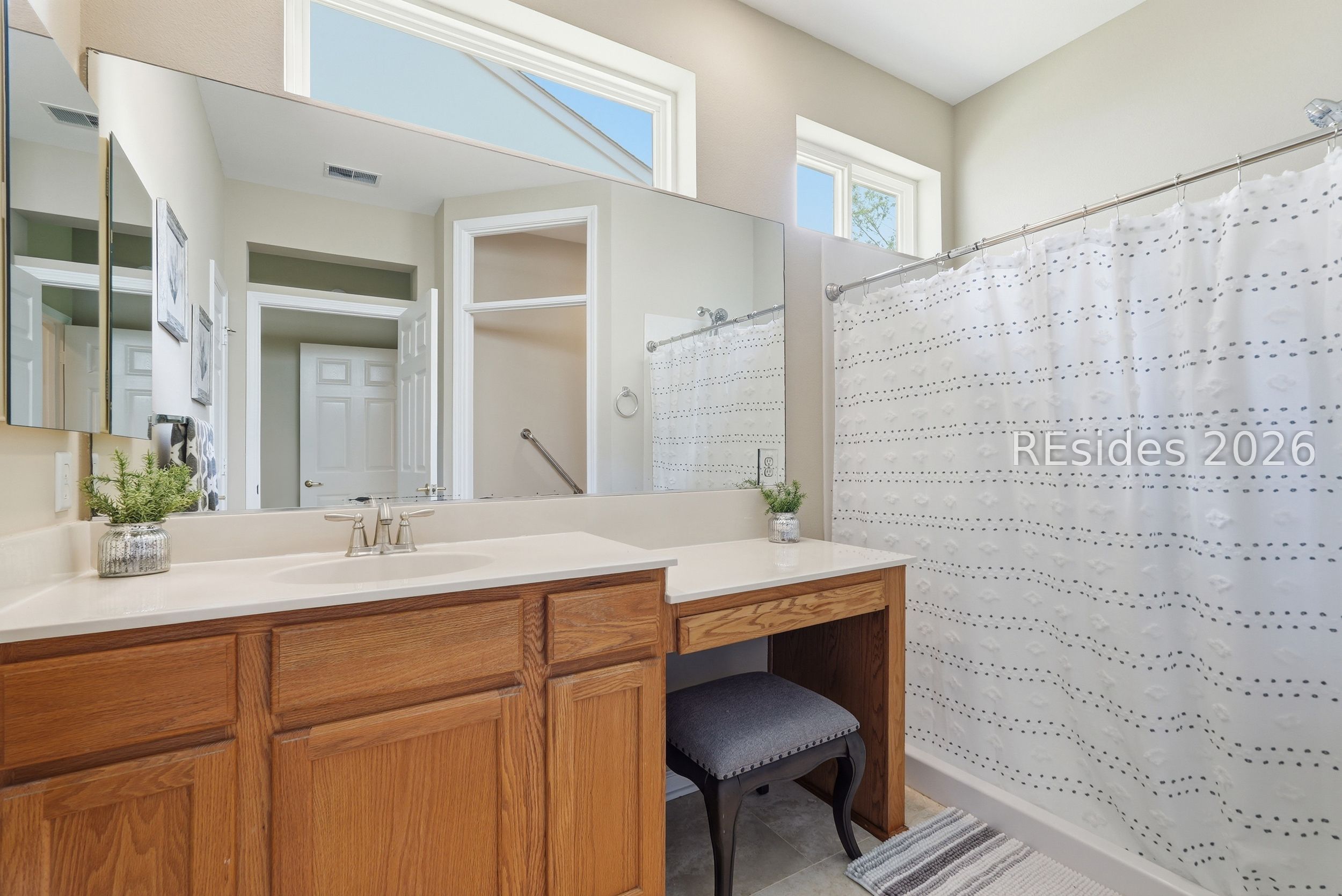 189 Hampton Circle Bluffton, SC 29909 - Photo 26 of 66 Primary bath with transom window, walk-in shower