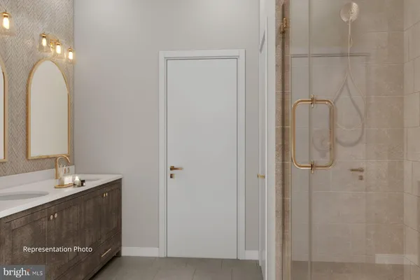 a bathroom with a double vanity sink a vanity and a mirror