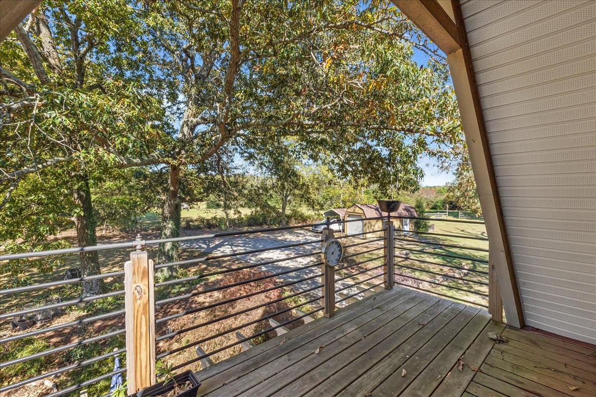 613 New Hope Road Manchester, TN 37355 - Photo 26 of 50 a view of a balcony with wooden floor