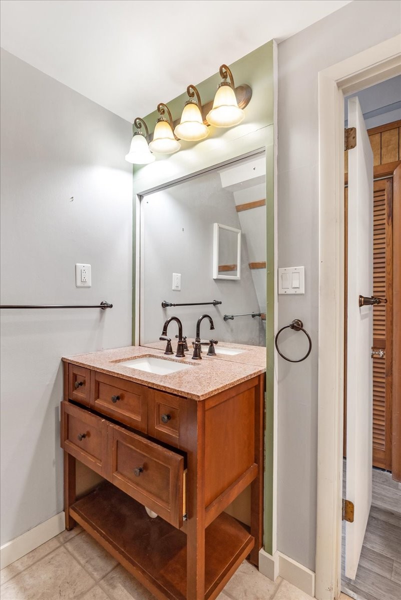 613 New Hope Road Manchester, TN 37355 - Photo 30 of 50 a bathroom with a sink vanity and a mirror