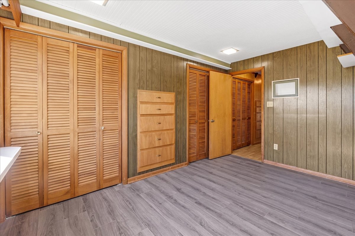 613 New Hope Road Manchester, TN 37355 - Photo 32 of 50 a view of an empty room with wooden floor and a window