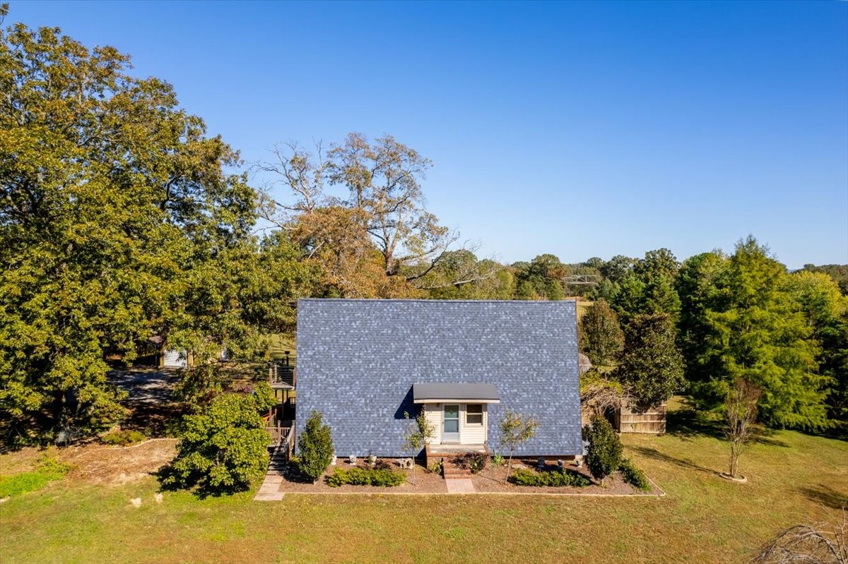 613 New Hope Road Manchester, TN 37355 - Photo 36 of 50 a aerial view of a house with a yard and large tree