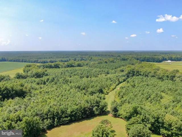 a view of an outdoor space with a lake view and mountain view