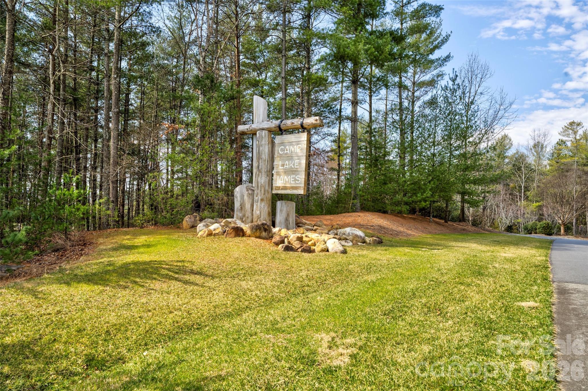 2086 October Drive, Unit 147 Nebo, NC 28761 - Photo 19 of 29 a view of a swimming pool with an outdoor space and seating area