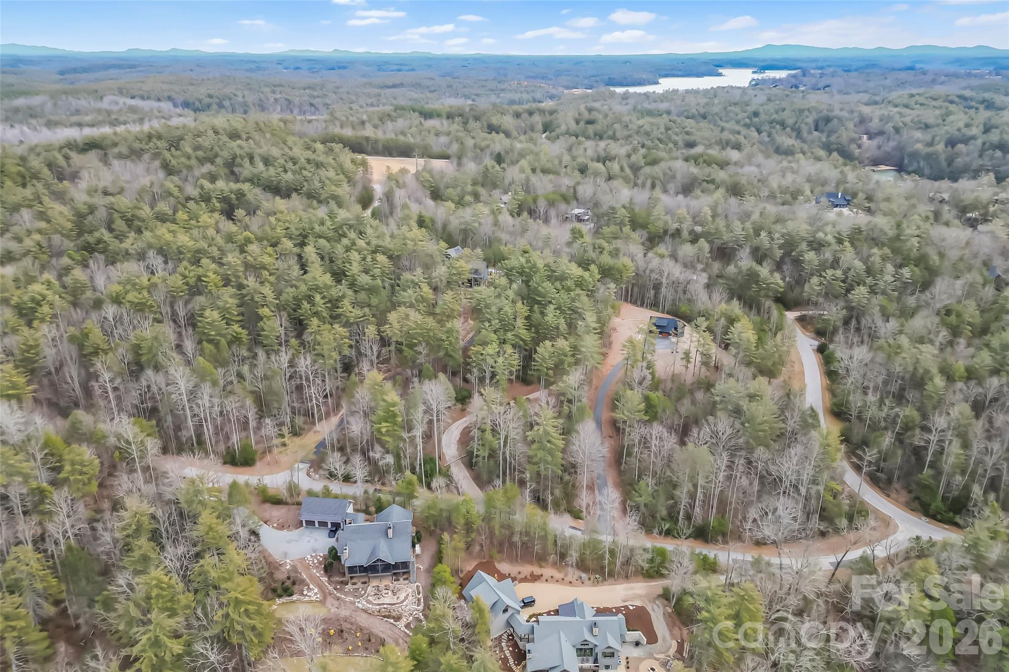 2086 October Drive, Unit 147 Nebo, NC 28761 - Photo 2 of 29 a view of a field with mountains in the background