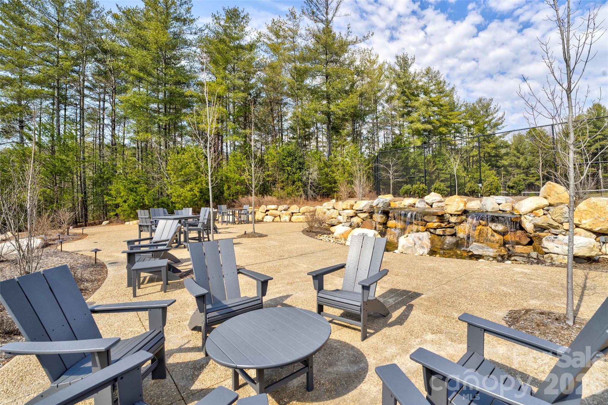 2086 October Drive, Unit 147 Nebo, NC 28761 - Photo 24 of 29 a view of a patio with chairs and tables