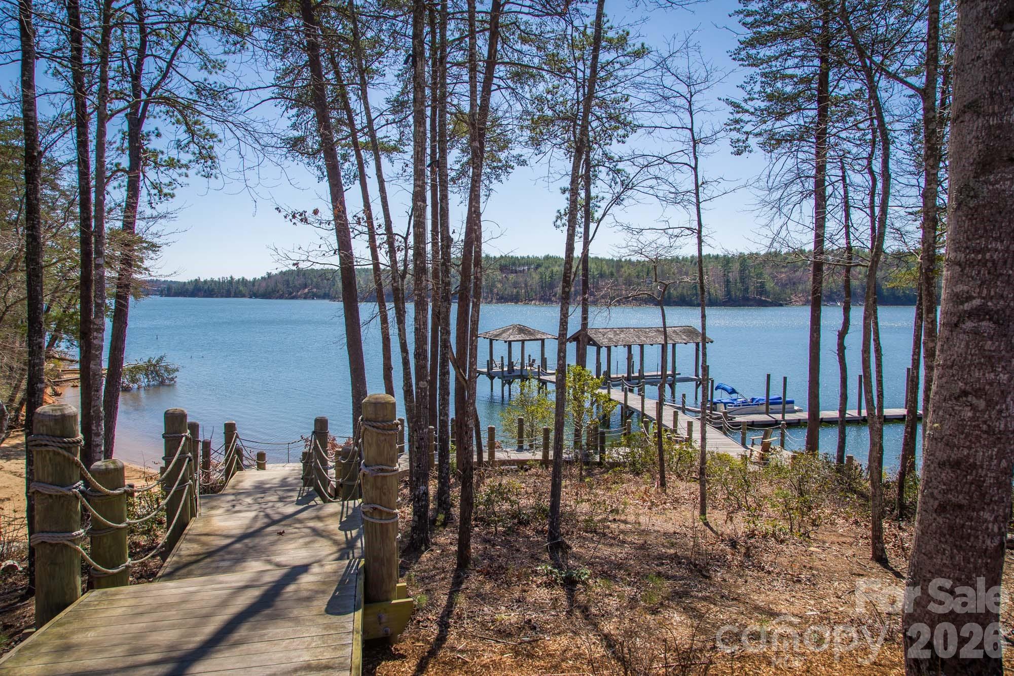 2086 October Drive, Unit 147 Nebo, NC 28761 - Photo 25 of 29 a view of a lake with a large trees