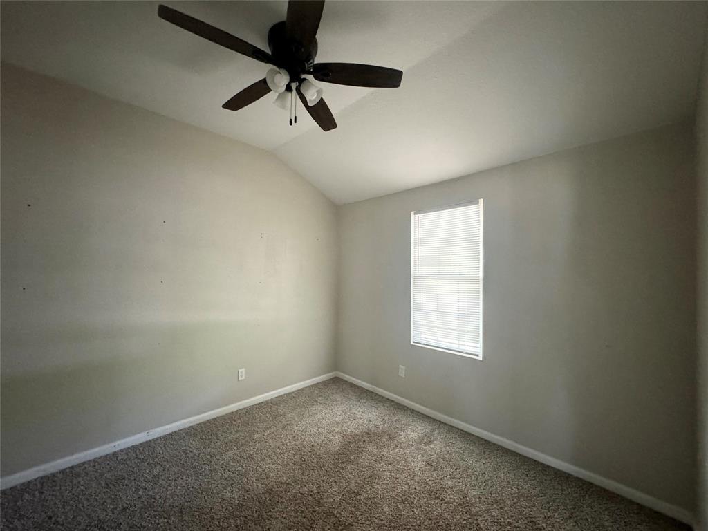 314 North Dubellette Street Weatherford, TX 76086 - Photo 22 of 30 an empty room with a window