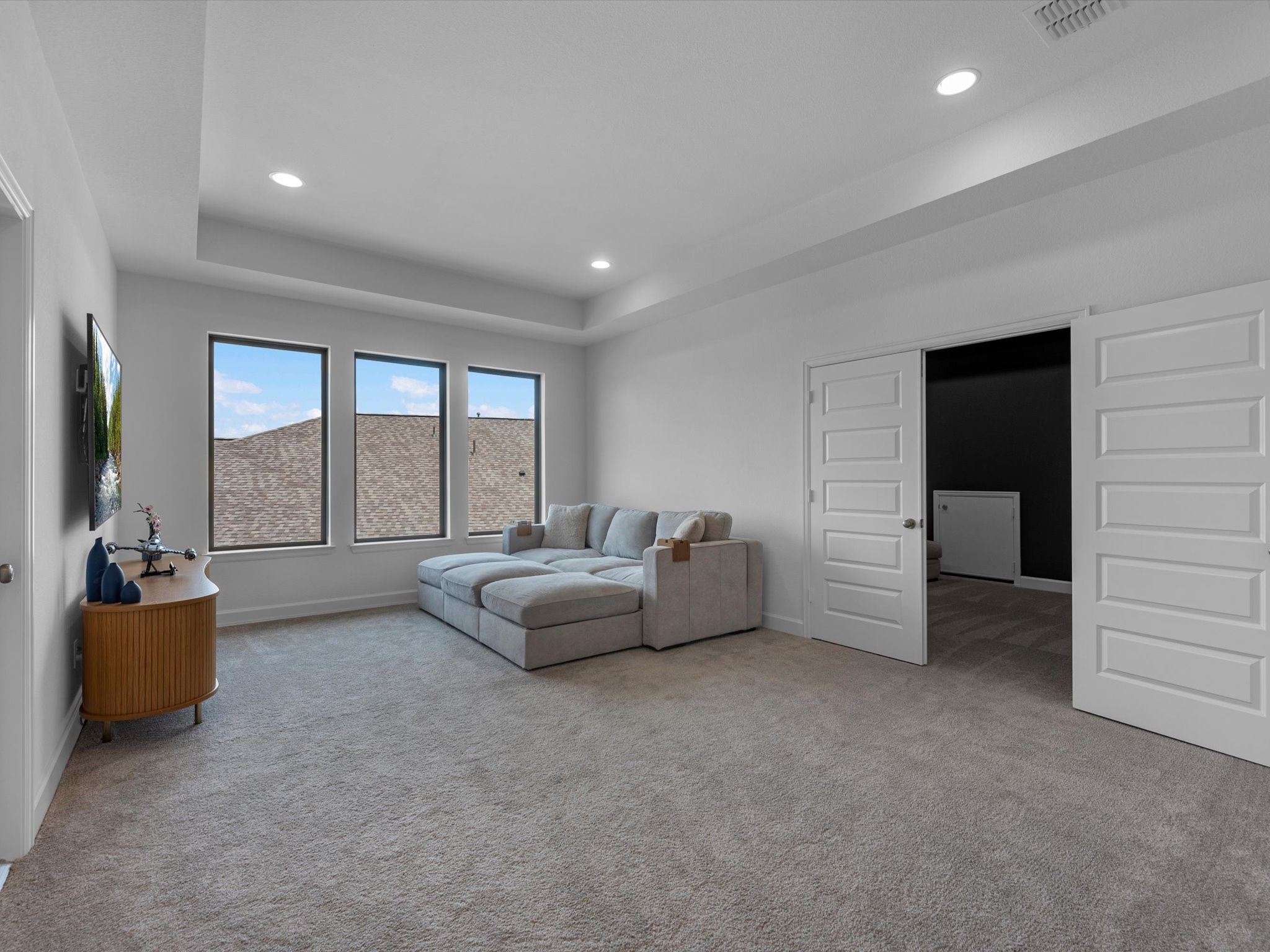 18714 Pistachio Way Manvel, TX 77578 - Photo 28 of 48 The oversized game room creates the perfect space for movie nights, game days, or a second living area, with direct access to the dedicated media room.