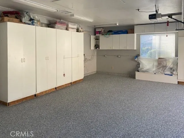 a view of a room that has a washer and dryer