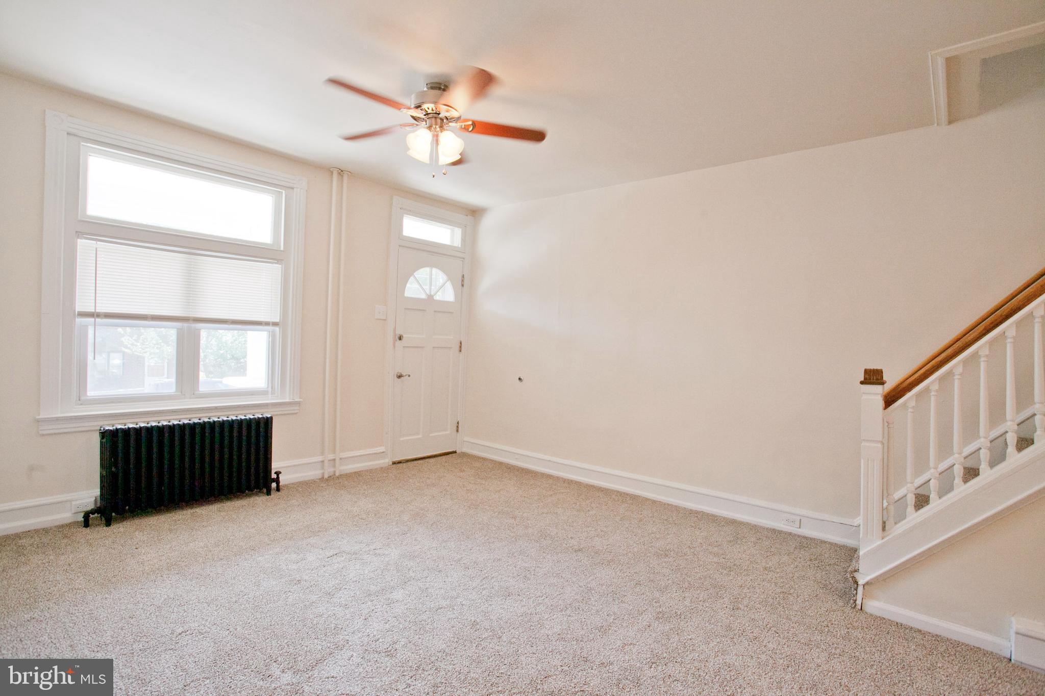 4205 Terrace Street Philadelphia, PA 19128 - Photo 3 of 30 an empty room with windows and fan