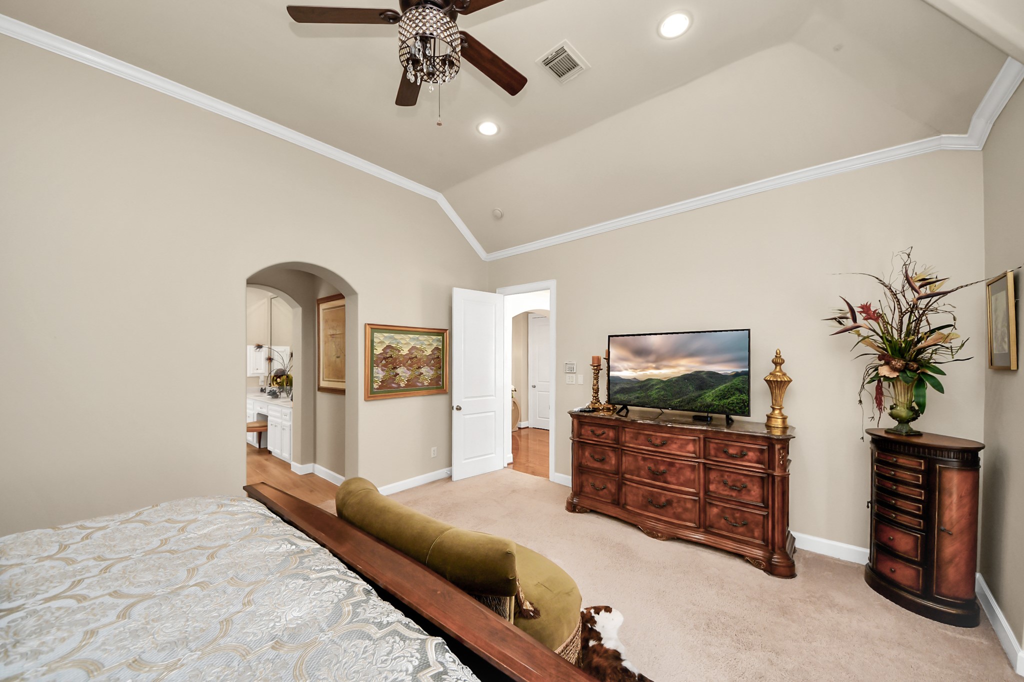 6302 Hermann Lake Drive Houston, TX 77021 - Photo 26 of 50 Another view of the spacious primary suite reveals the thoughtful layout and generous proportions of the room. The open entry leads seamlessly to the luxurious primary bathroom and walk-in closet beyond.
