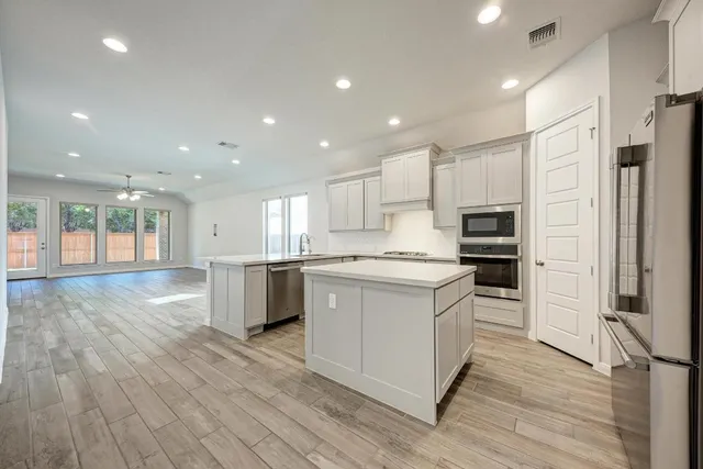 a picture of table and chairs with wooden floor