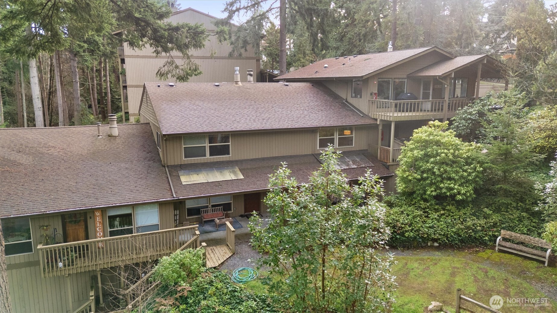 8515 Main Street, Unit 103 Edmonds, WA 98026 - Photo 27 of 34 a aerial view of a house with a yard
