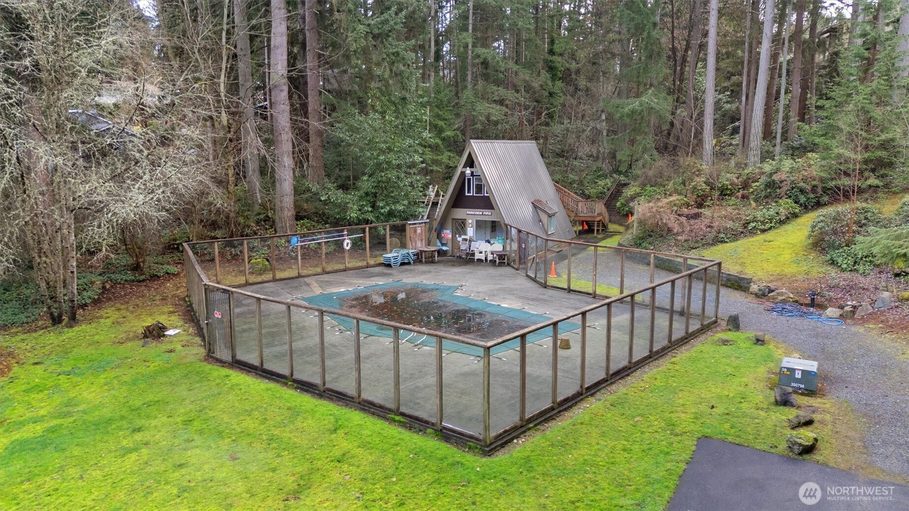 8515 Main Street, Unit 103 Edmonds, WA 98026 - Photo 29 of 34 a view of a terrace with a garden