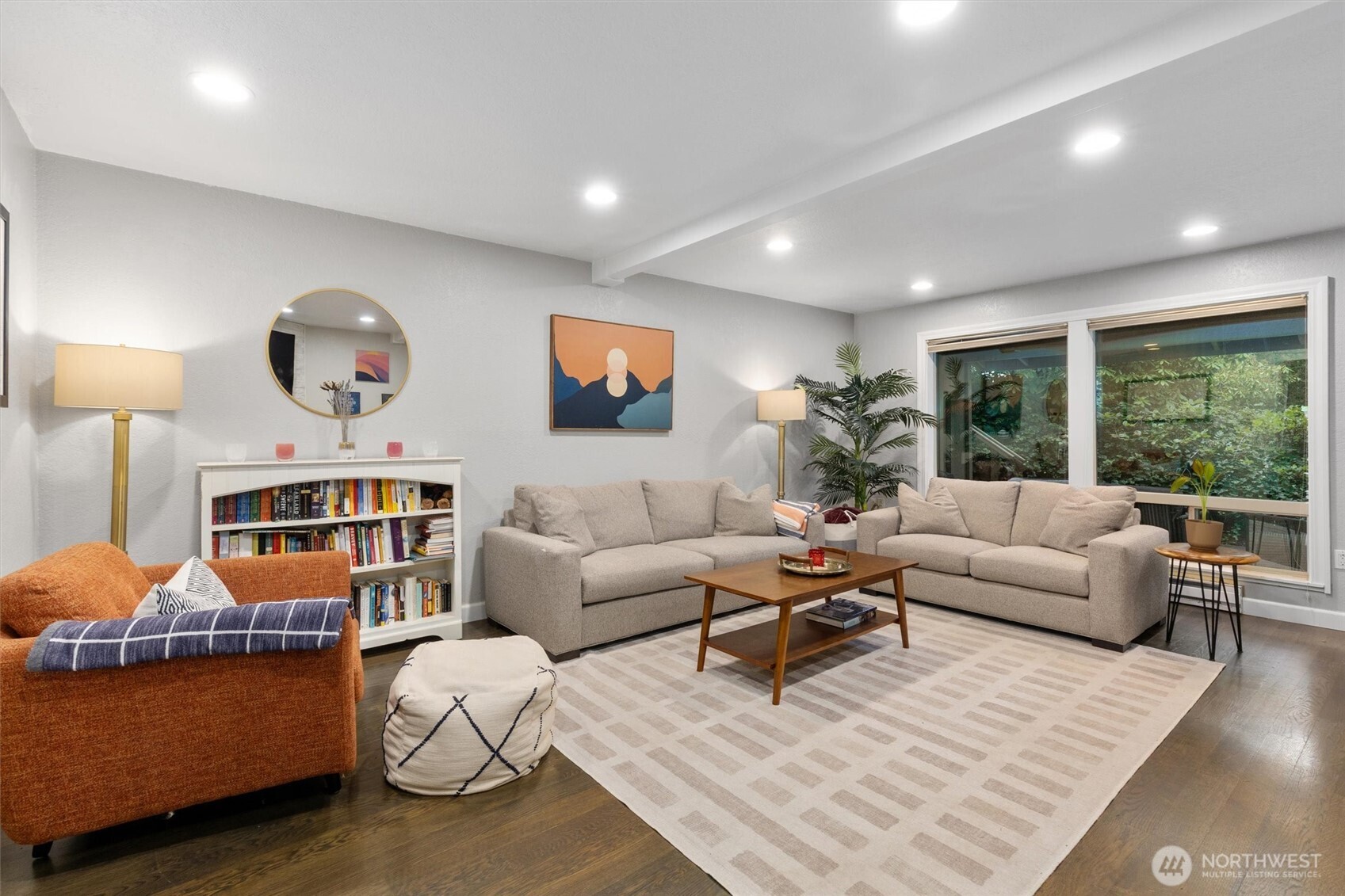 8515 Main Street, Unit 103 Edmonds, WA 98026 - Photo 5 of 34 a living room with furniture and a large window