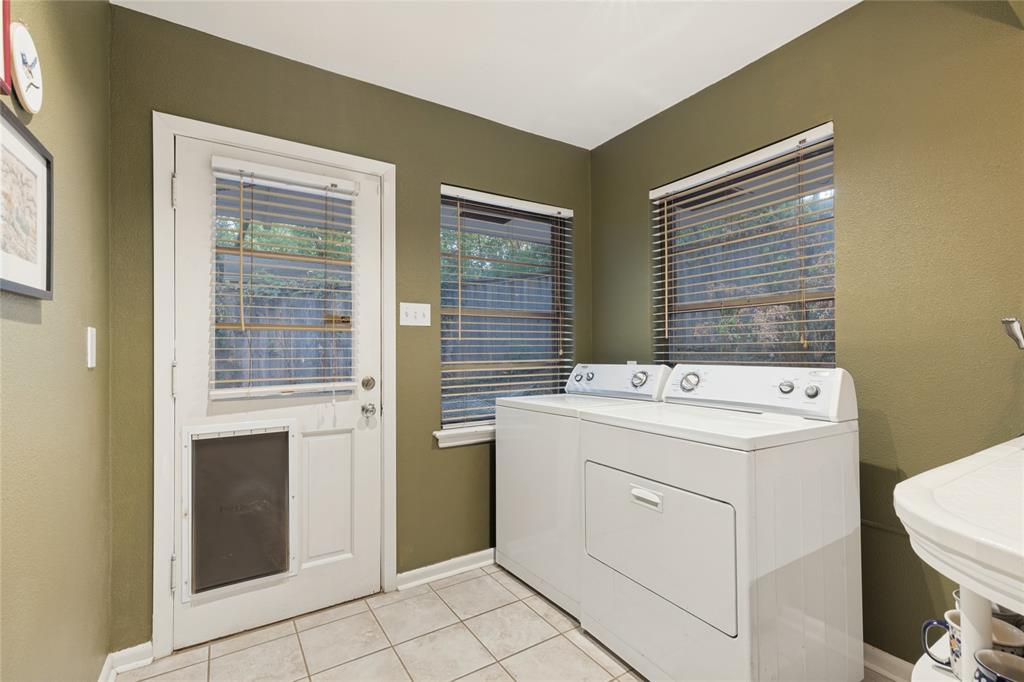 737 North Hampton Road Dallas, TX 75208 - Photo 16 of 30 The Utility Room provides additional storage and convenient access to the outdoors.